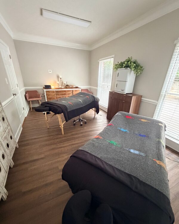 Treatment room with two tables at the new Athens studio